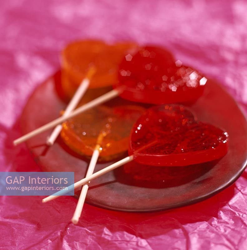 Lollipops in plate close-up
