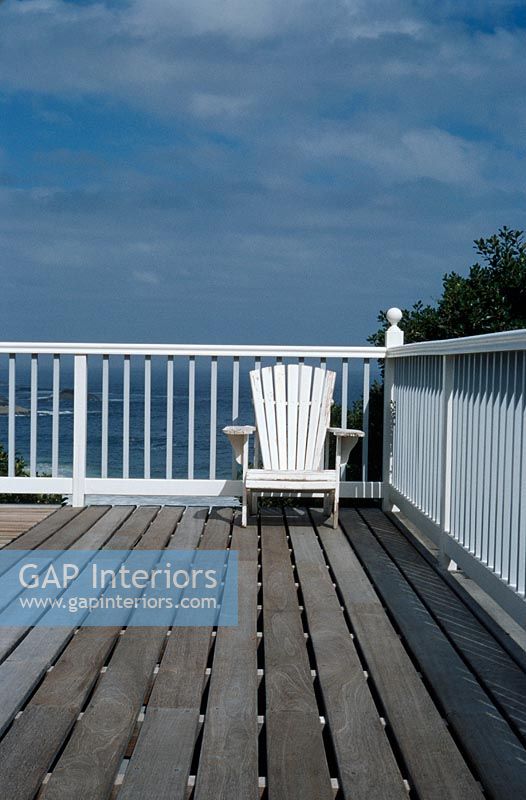 Deck patio with an Adirondack chair