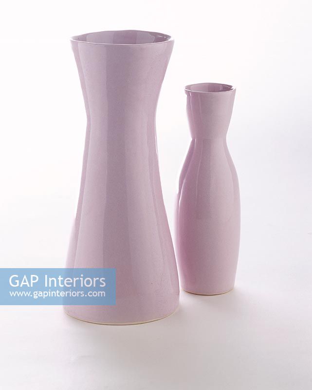 Two light purple vases