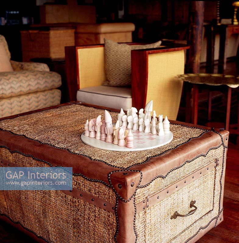 Old traveling trunk with a chess set