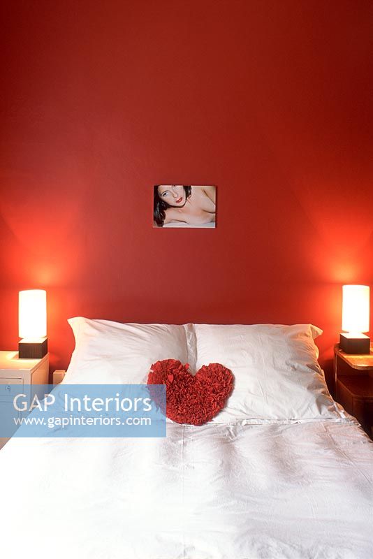 View of modern bedroom with heart shape symbol