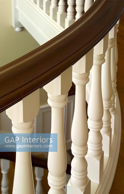 Close up traditional curved banister