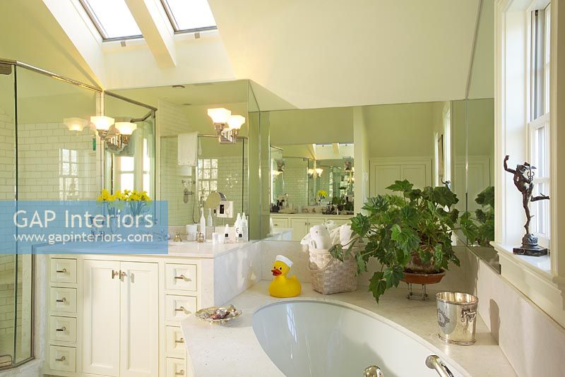 Traditional bathroom with pitched ceiling