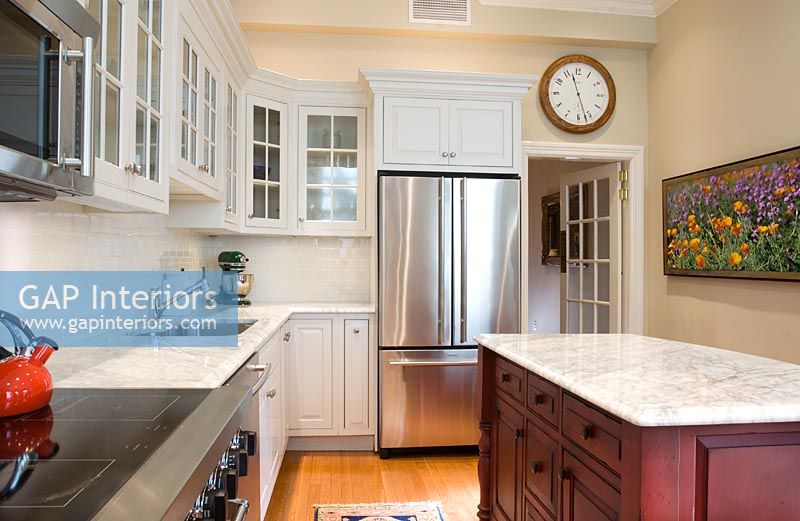 Traditional kitchen with marble countertops
