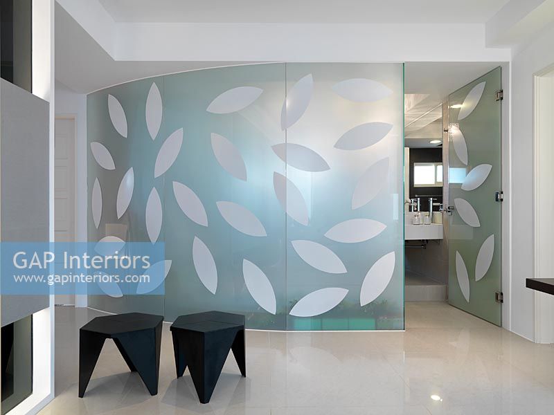 Glass walls with leaf pattern