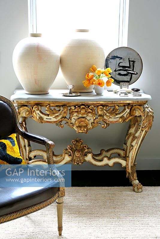 Ornate console table in living room 