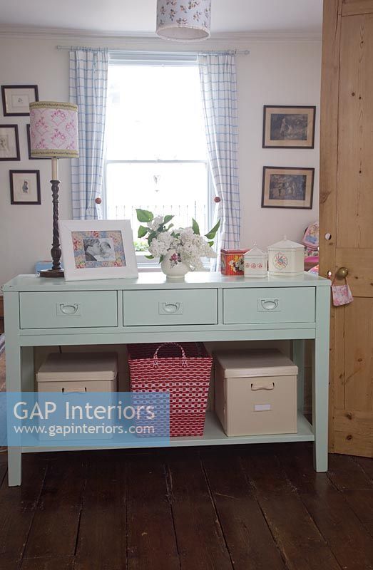 Console table with storage boxes