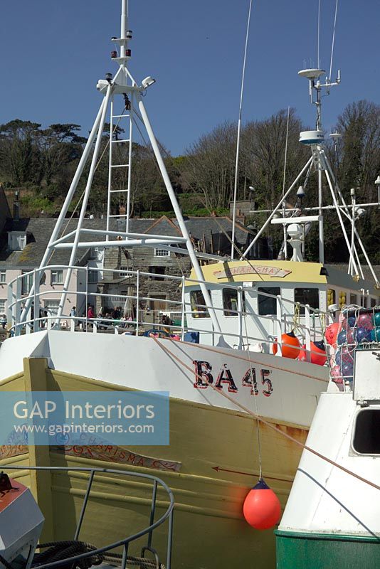 Yellow fishing boat in Padstow harbour