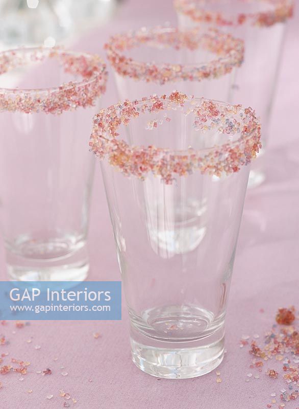 Decorated glasses on table