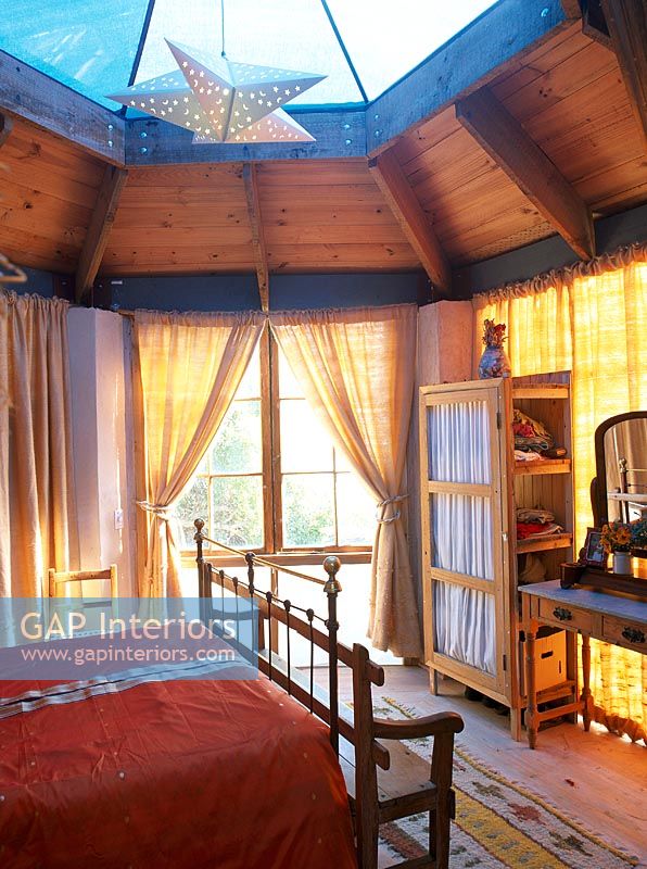 Cosy bedroom with octagonal skylight