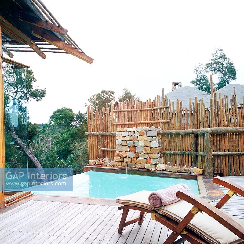 Wooden deck with small swimming pool