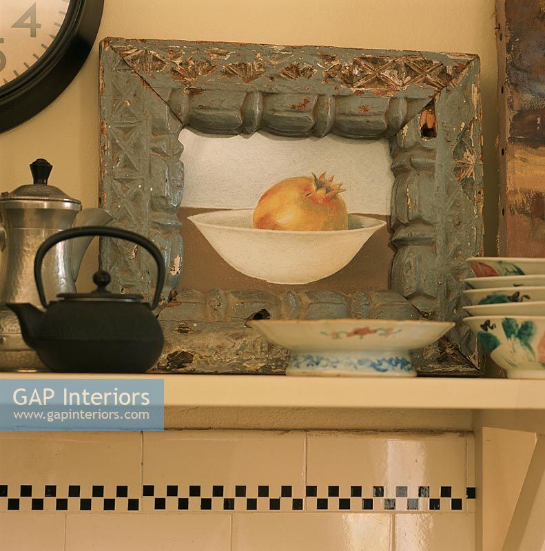 A vintage painting in a kitchen