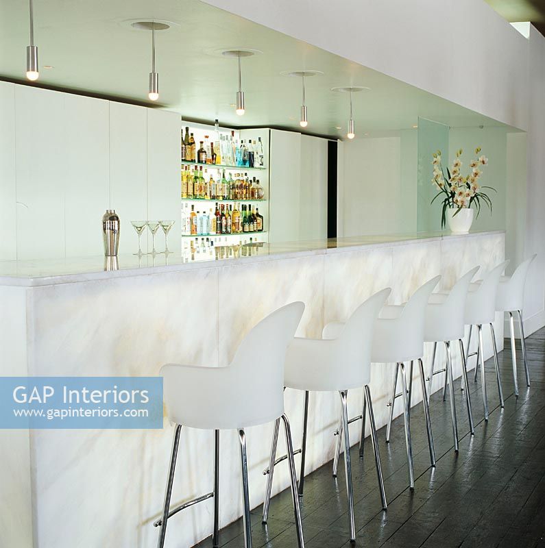 View of bar with bar stools