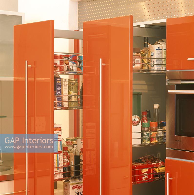 View of groceries in open cabinet