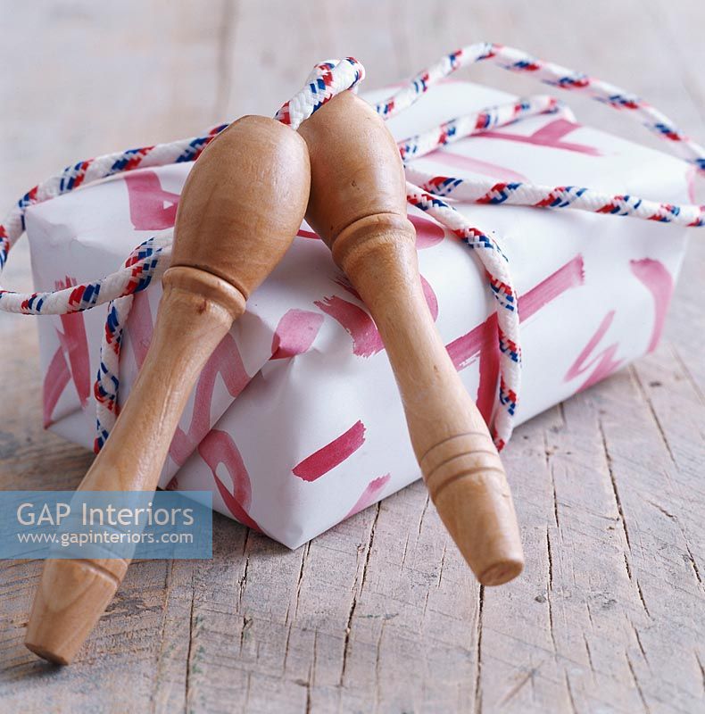 Wrapped gift and a skipping rope bow