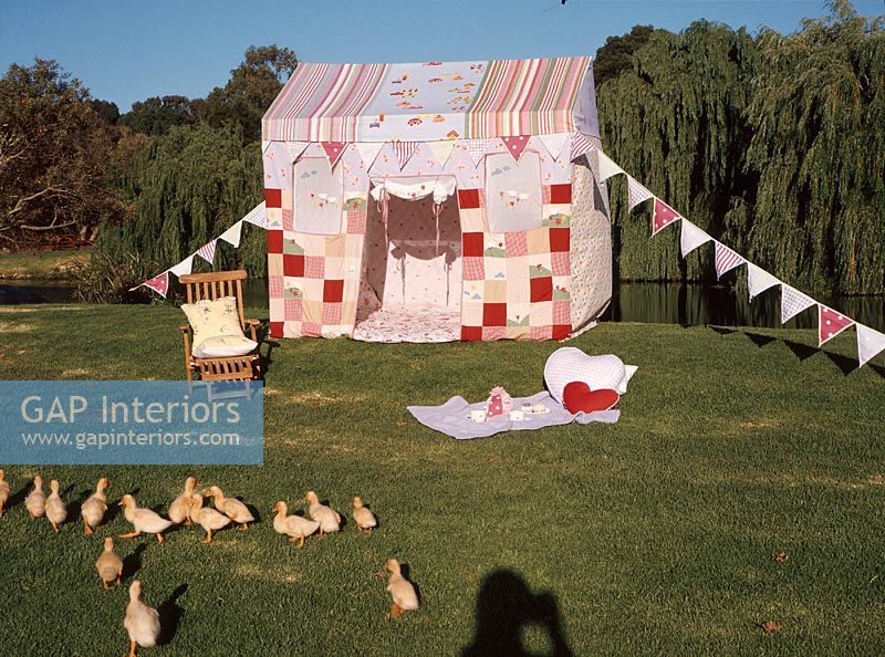 A child's tent in a garden