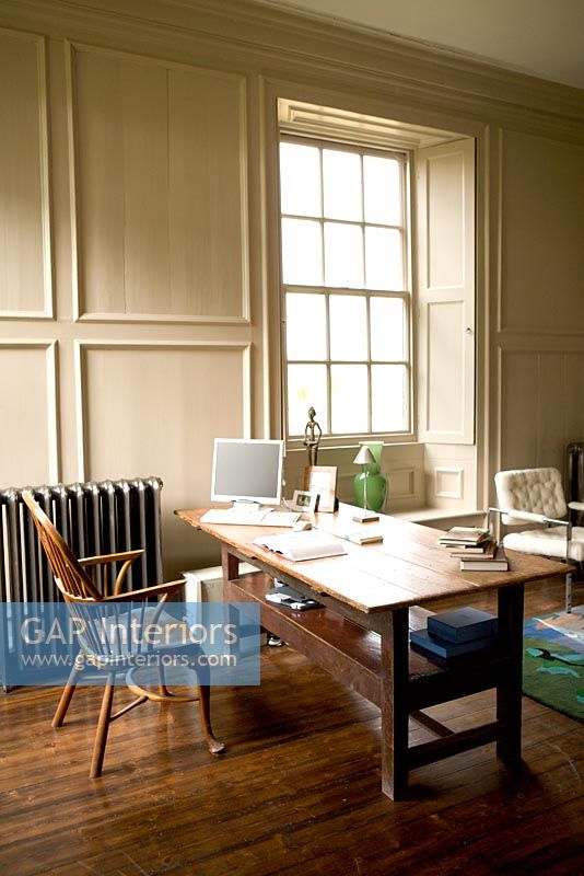 Home office space with wooden desk