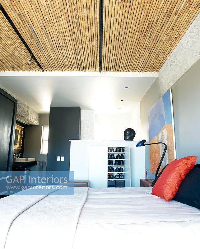 Contemporary bedroom with bamboo ceiling