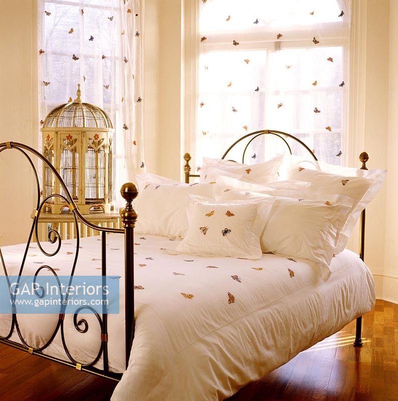 Iron bed in classic bedroom 