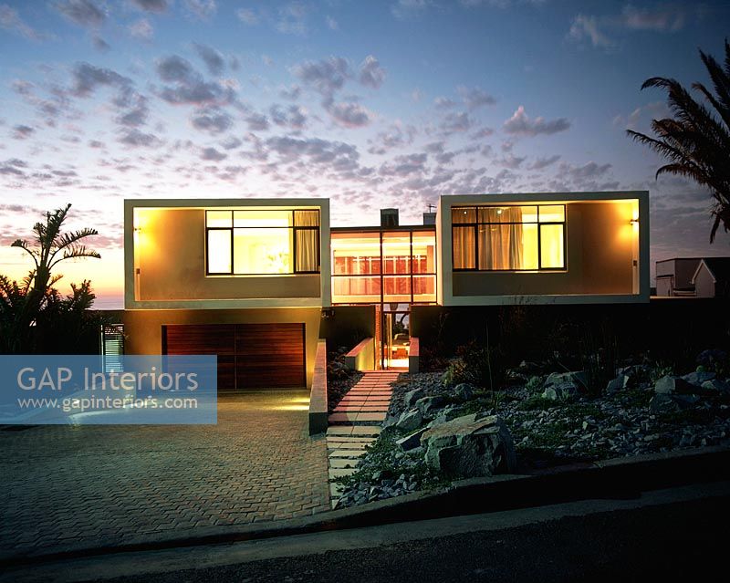 Modern house exterior at night