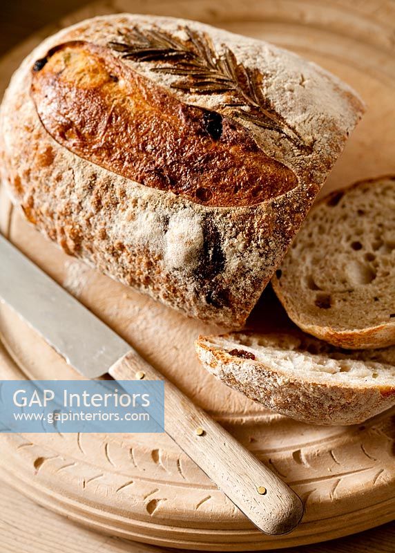 Close-up of bread on bread board