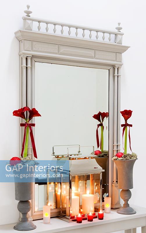 Candles on modern console table 