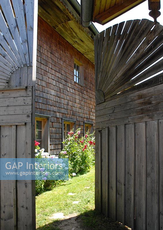 Wooden gate to country house 