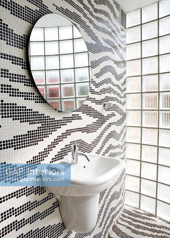 Modern bathroom with patterned tiled walls