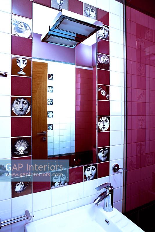 Modern tiles around bathroom mirror 