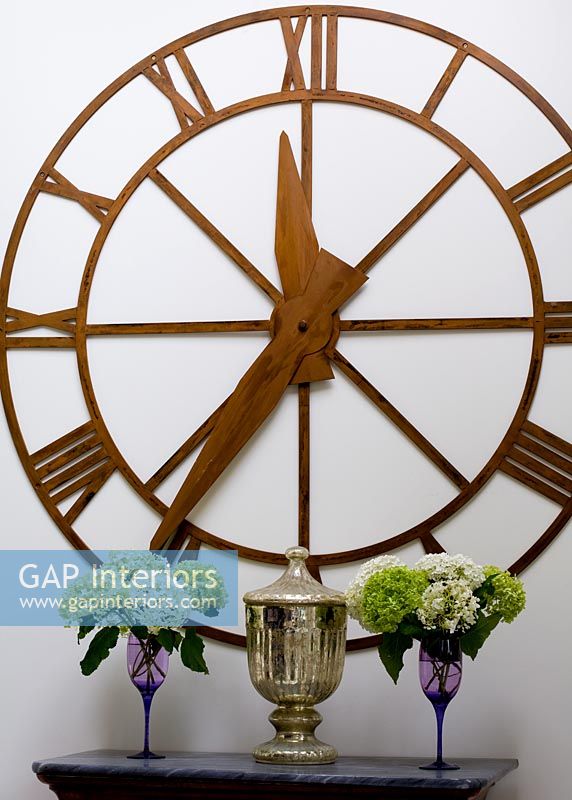 Large wooden wall clock detail