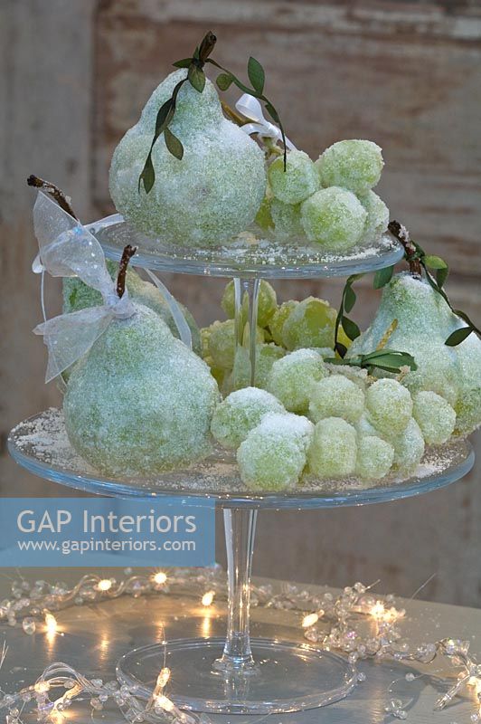 Decorative sugared fruit on cake stand