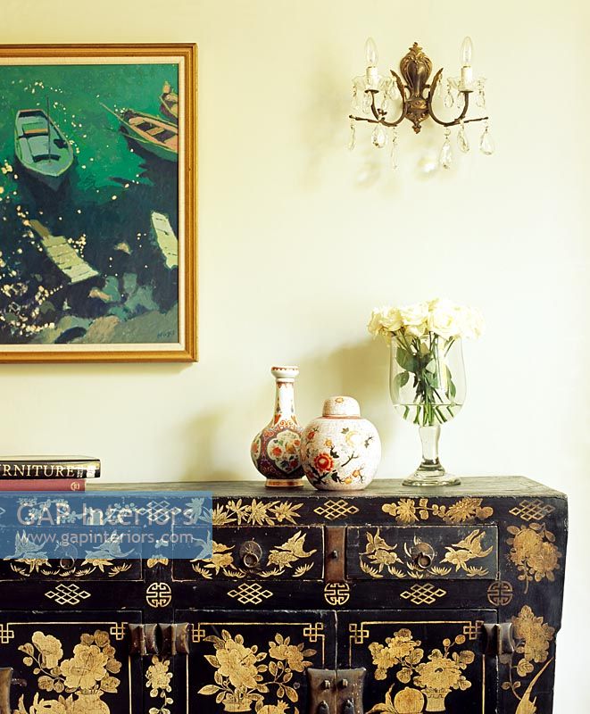 Oriental sideboard in classic living room 