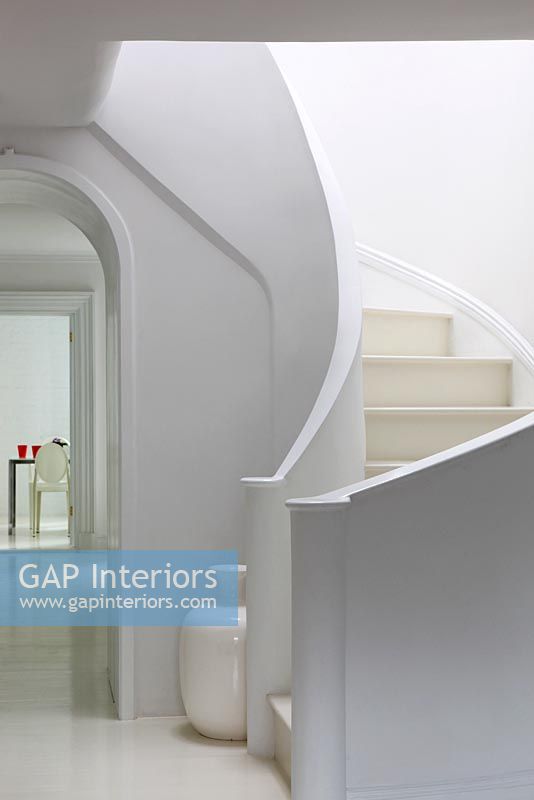 White curved modern staircase 