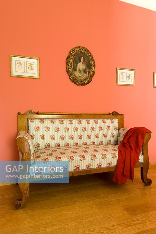 Floral sofa in classic bedroom, detail