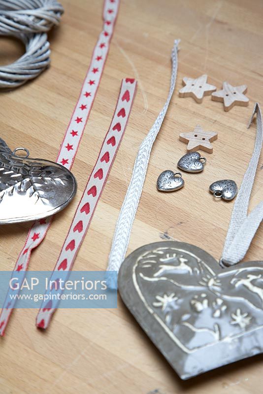 Metal heart and ribbon decorations, detail