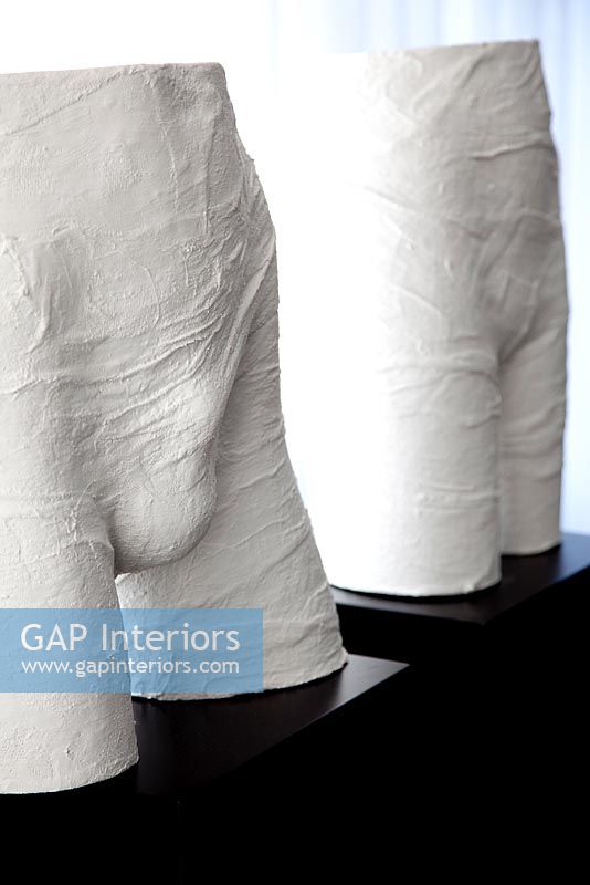 Male and female body cast sculptures, detail