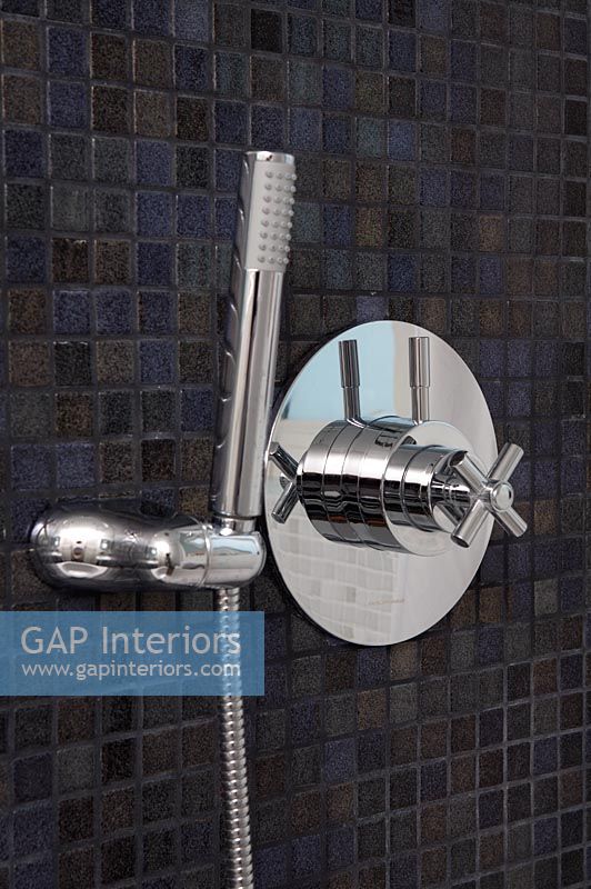 Modern shower head and tap, detail
