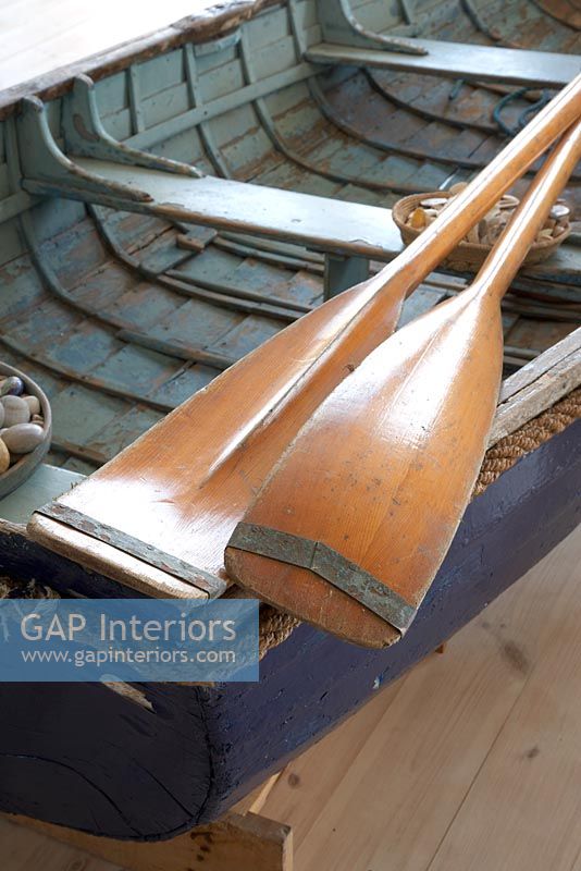 Rowing boat and oars, detail
