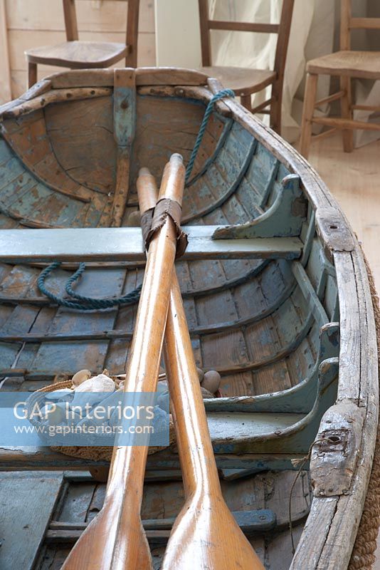 Rowing boat and oars, detail