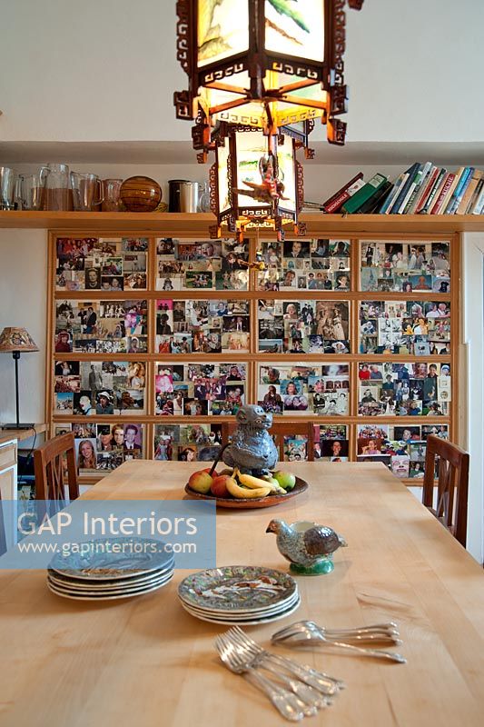 Modern dining room with display of photos