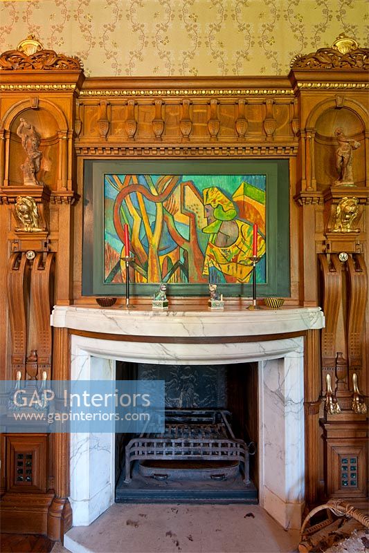 Modern painting over classic mantelpiece