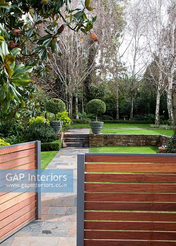 Modern gate to classic formal gardens 
