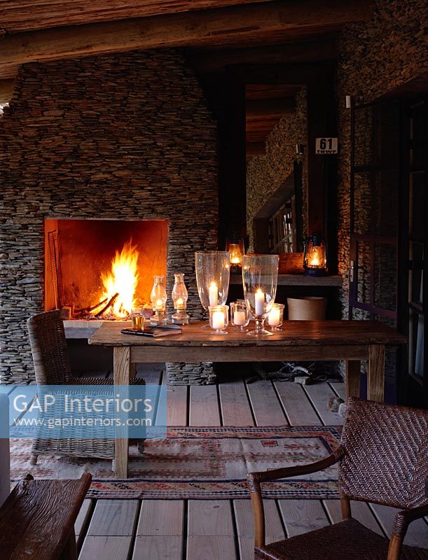 Outdoor fireplace on country terrace