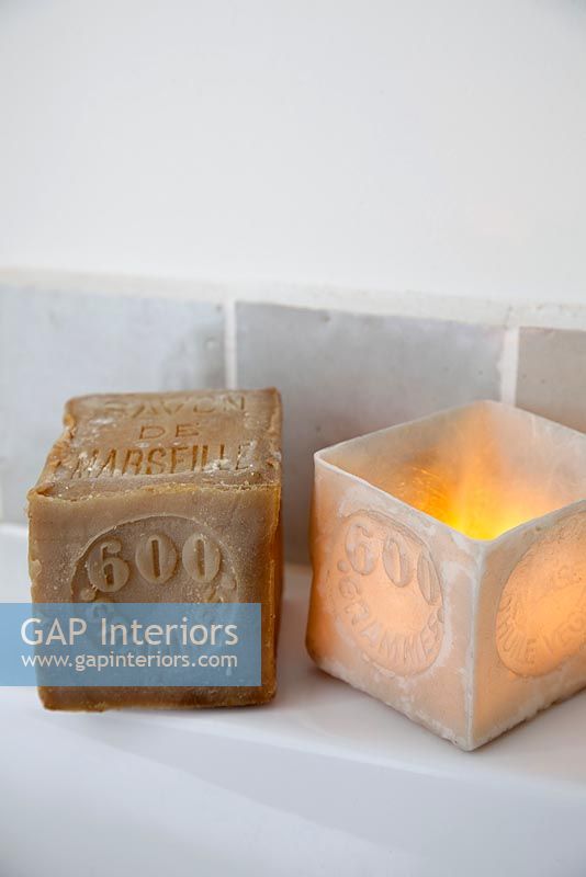 Modern candle and soap in bathroom, detail