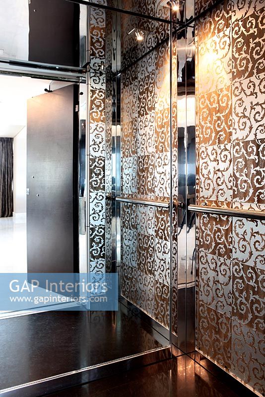 Modern hallway with patterned tile walls