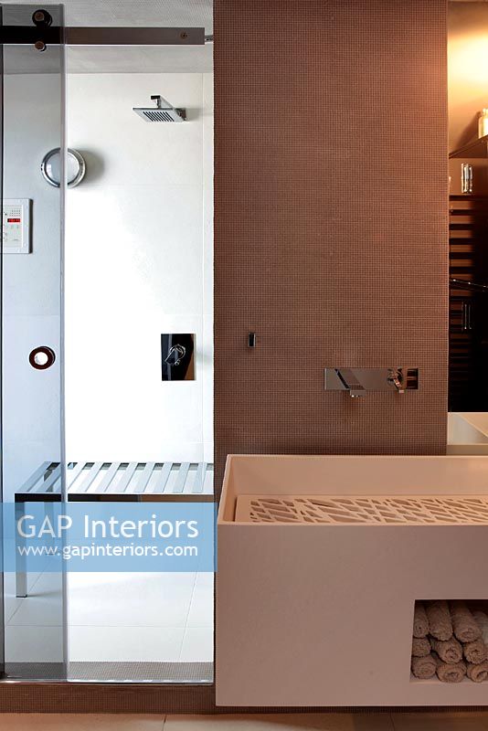 Contemporary shower cubicle and shower chair