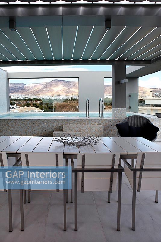 Modern covered roof terrace and pool