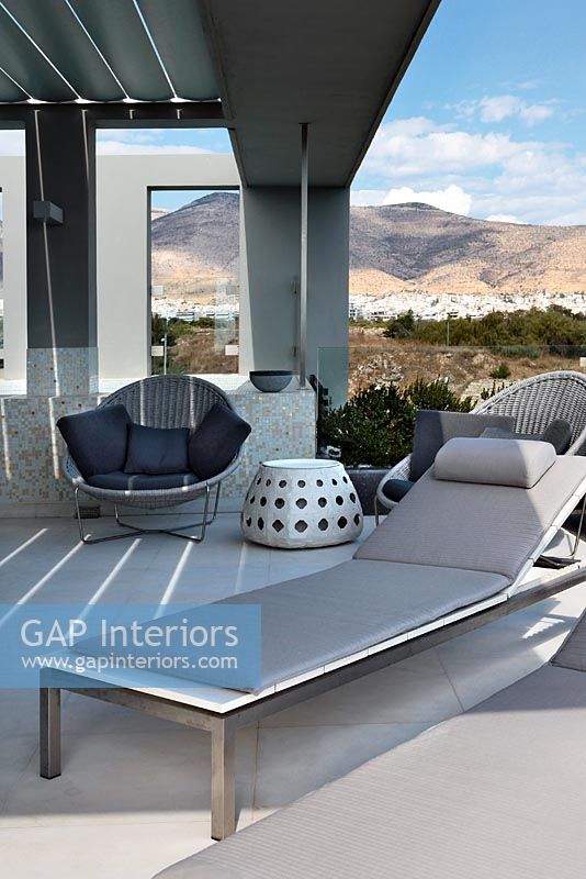 Modern garden furniture on roof terrace 