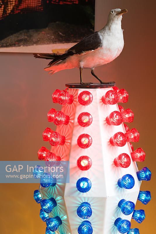 Reclaimed light with stuffed seagull