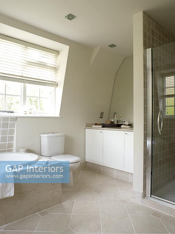 Contemporary bathroom with sloping walls